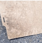 mold on the board that covers the tire in the trunk